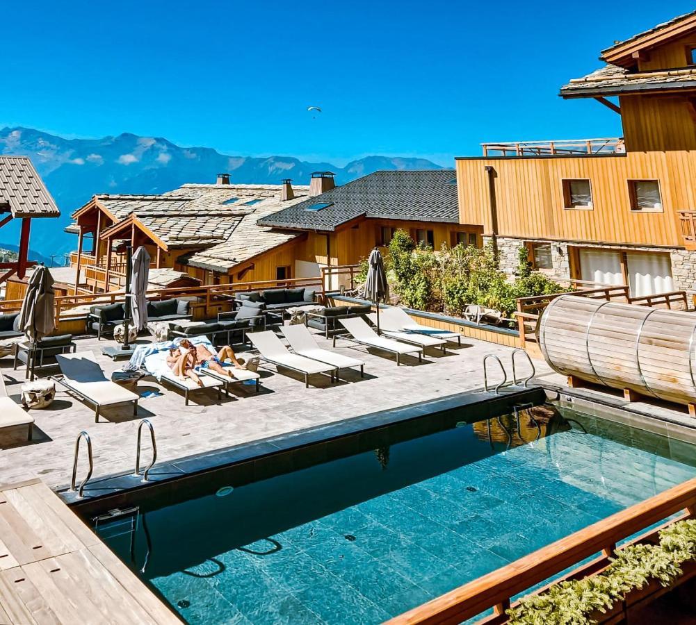 Grandes Rousses Hotel & Spa Alpe d'Huez Dış mekan fotoğraf The swimming pool at the 7132 Summit